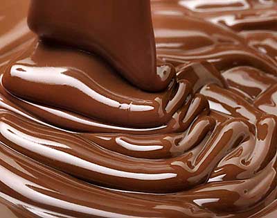 liquid chocolate pouring downward